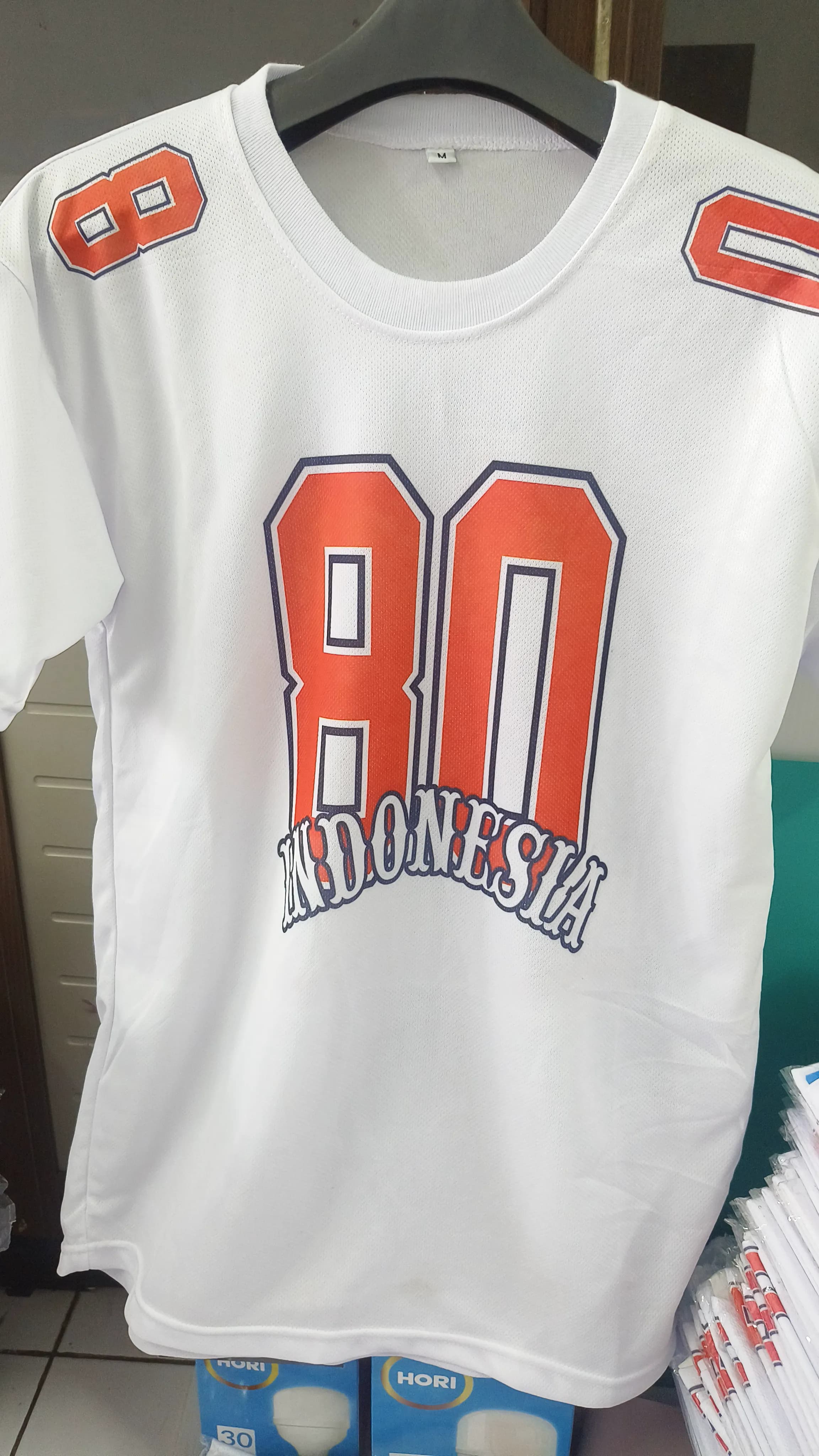 Kaos polo perusahaan